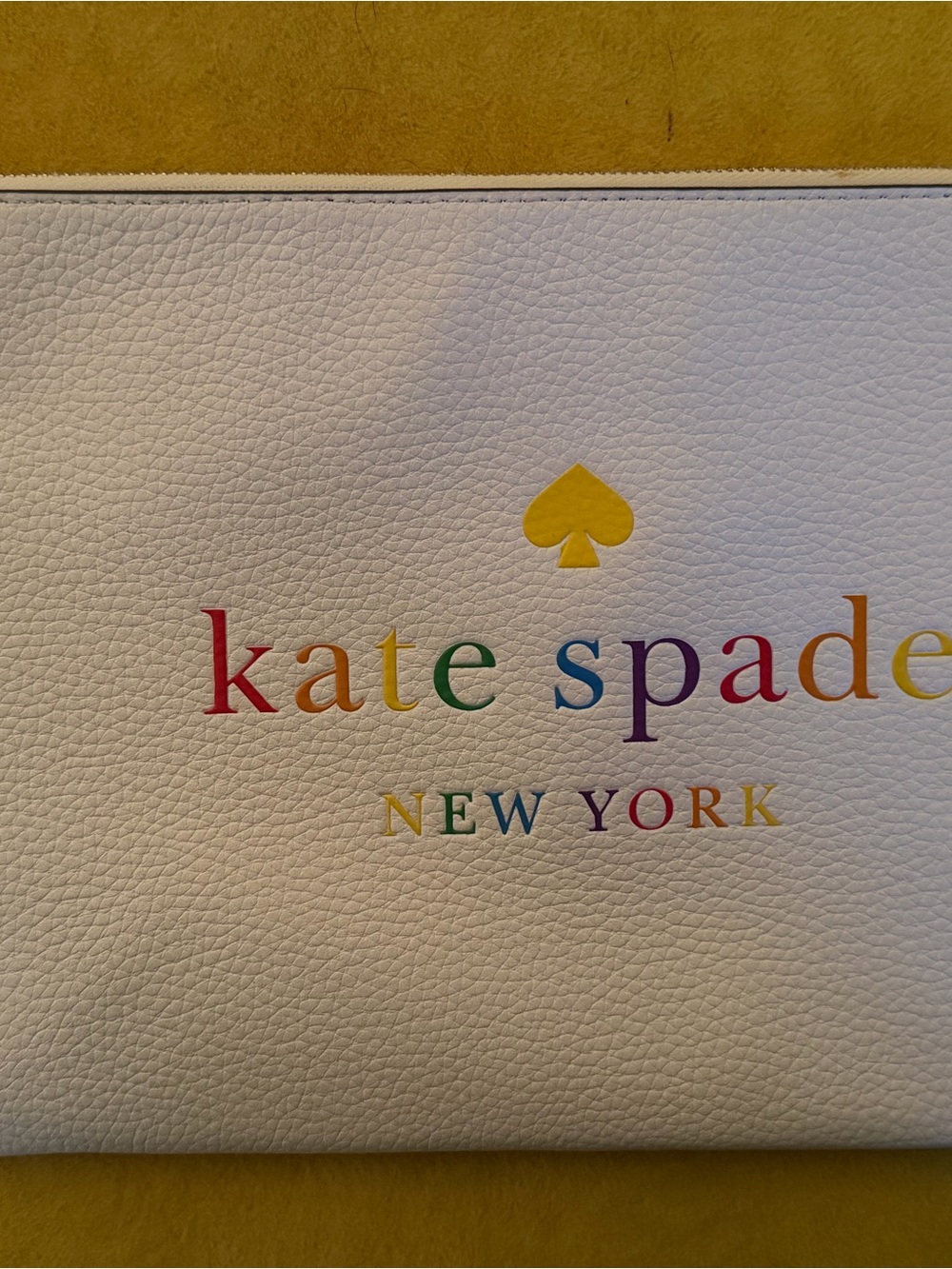 kate spade White Leather Clutch with Rainbow Logo